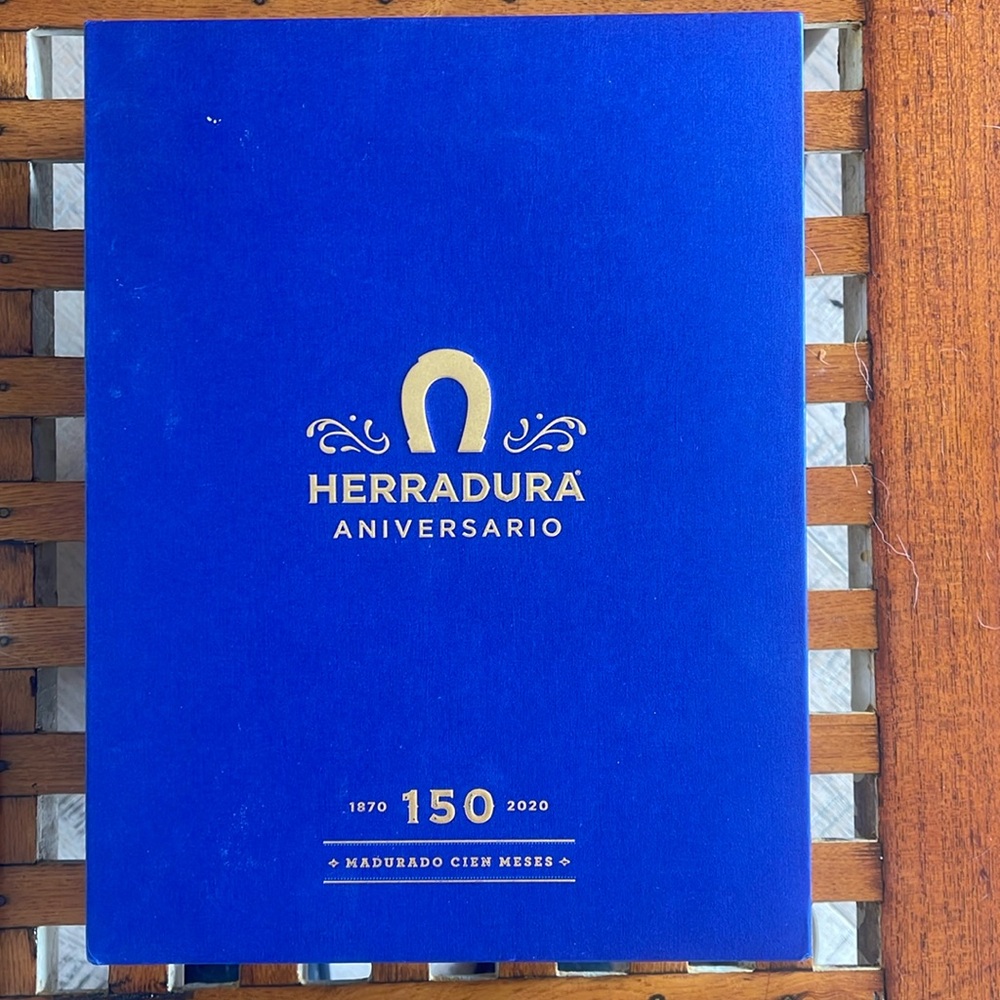 Empty bottle of Herradura Aniversario with box.  Excellent condition.